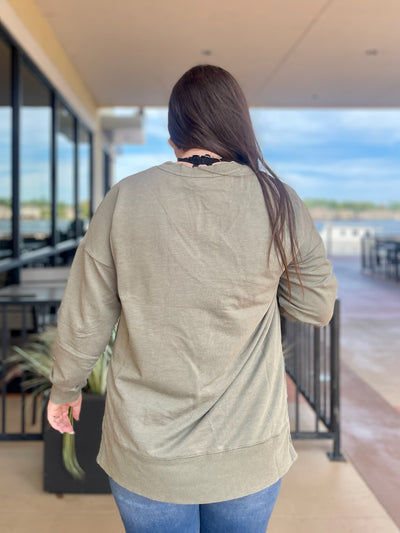 BACK VIEW OF KOURNTEY IN TOP