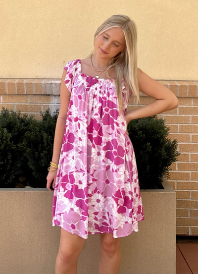 AVA LOOKING DOWNWARDS IN DRESS