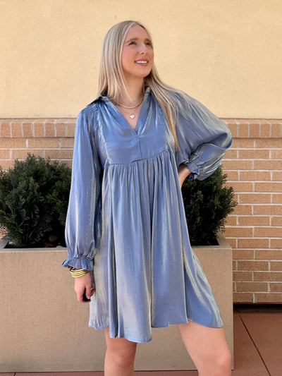 AVA LOOKING UPWARDS IN DRESS