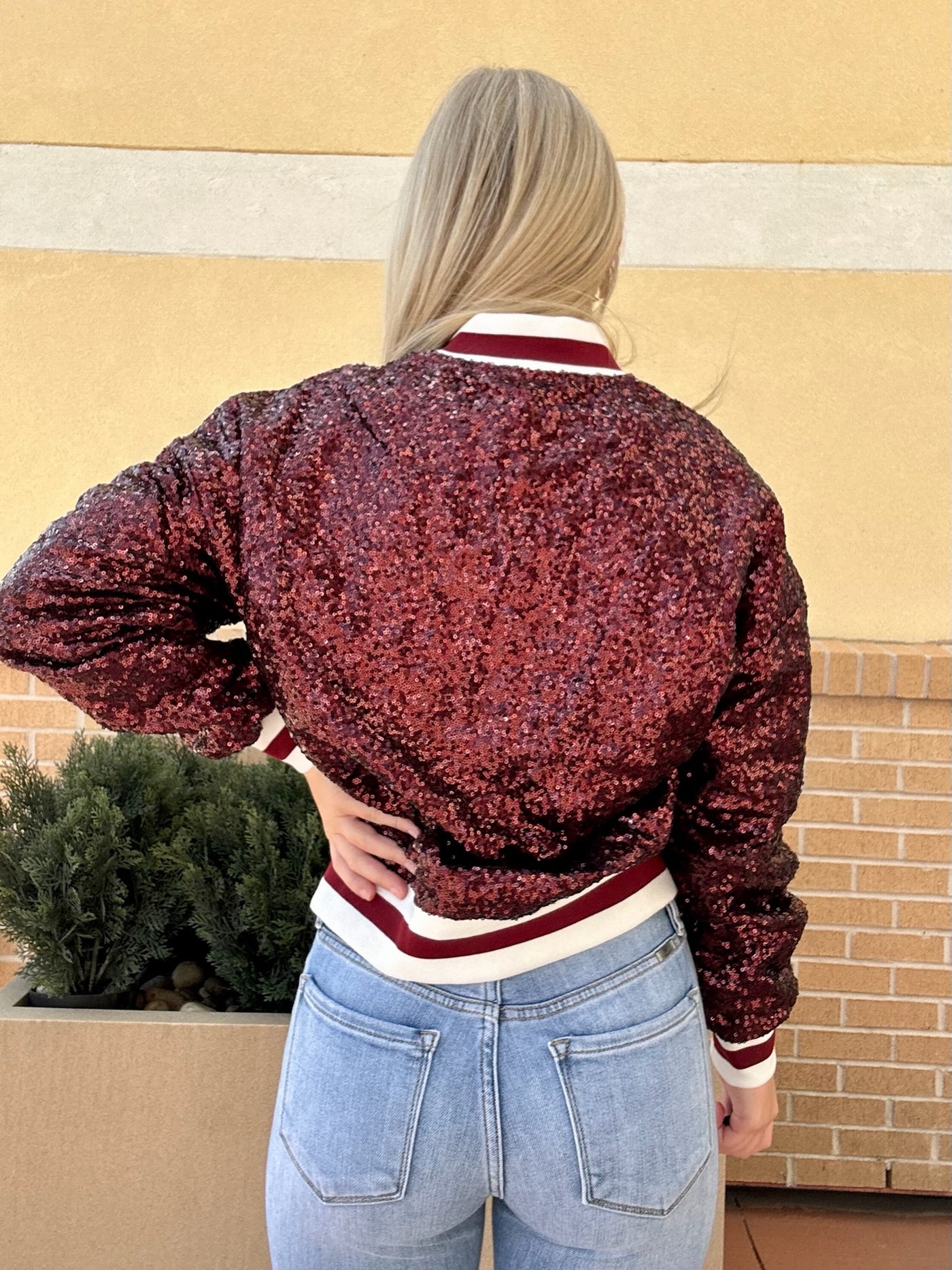 BACK VIEW OF  AVA IN JACKET
