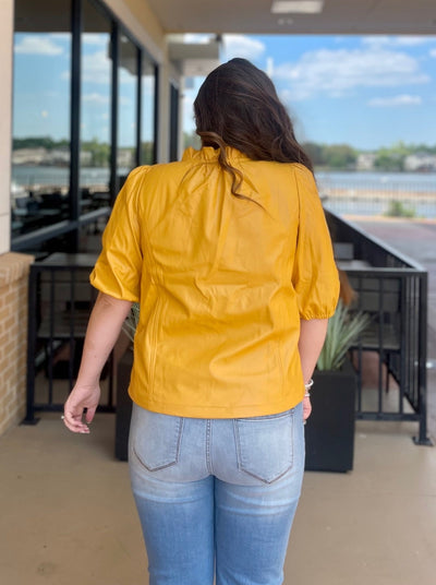 BACK VIEW OF KOURTNEY IN TOP