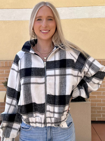 AVA SMILING AT CAMERA IN JACKET