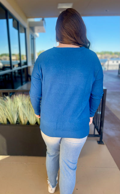BACK VIEW OF KOURTNEY IN SWEATER