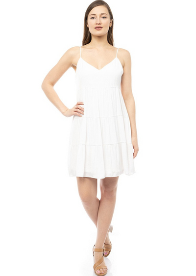 MODEL IN WILLOW FLARE DRESS OFF WHITE FRONT VIEW