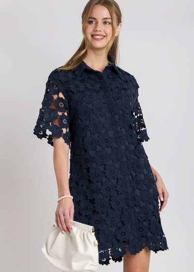 MODEL IN JADA FLORAL A LINE DRESS NAVY FRONT VIEW