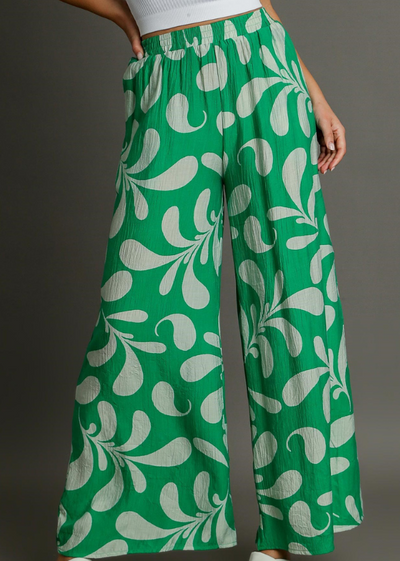 MODEL IN KAYDENCE CRINKLED PALAZZO PANTS GREEN FRONT VIEW