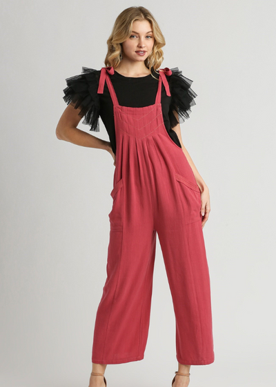 MODEL IN KYLEE PLEATED JUMPSUIT RUBY FRONT VIEW