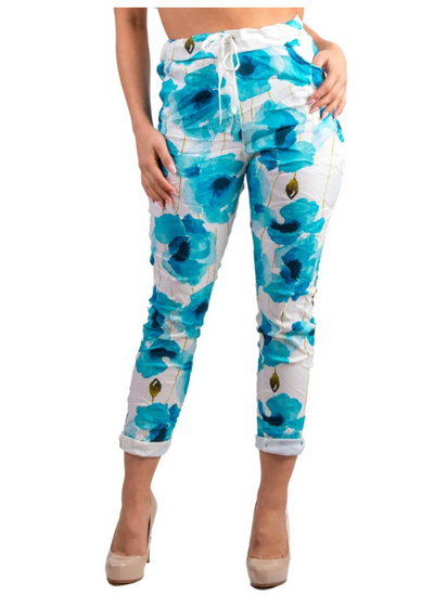MODEL IN LIANA FLORAL PANT TURQUOISE FRONT VIEW
