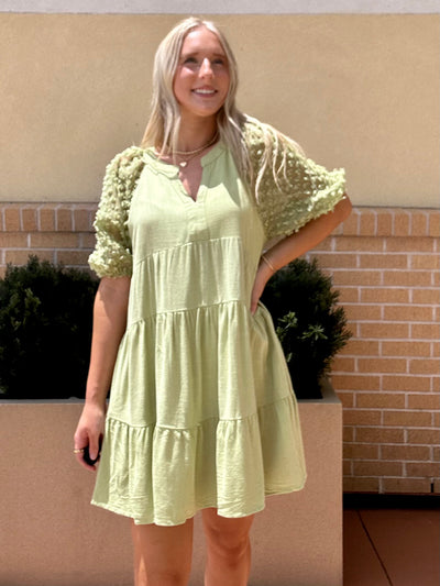 AVA LOOKING UPWARDS IN DRESS