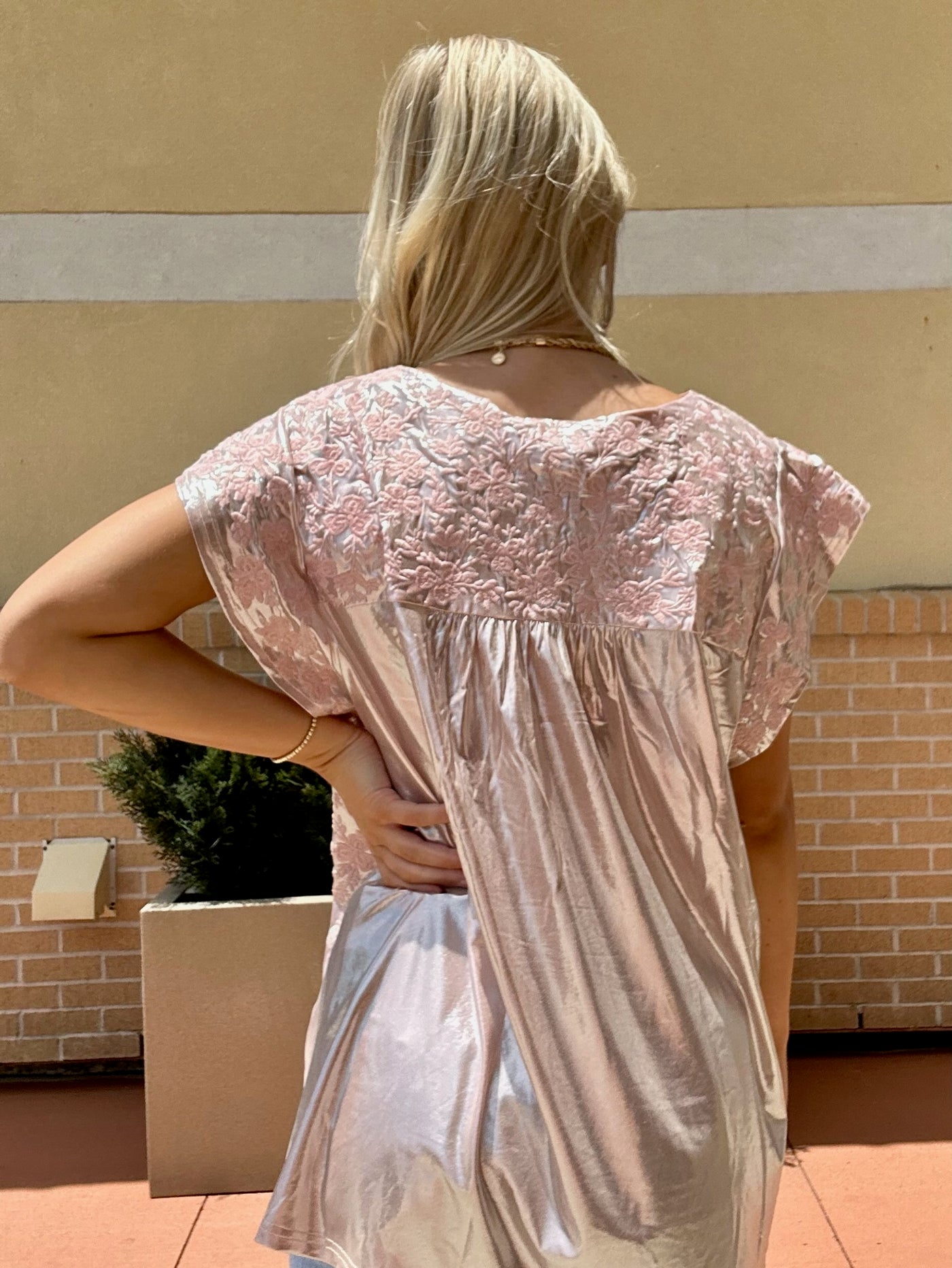 BACK VIEW OF AVA IN BLOUSE
