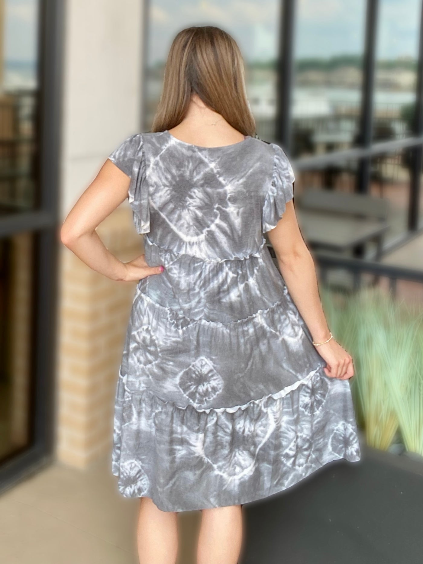 BACK VIEW OF JENNA IN DRESS