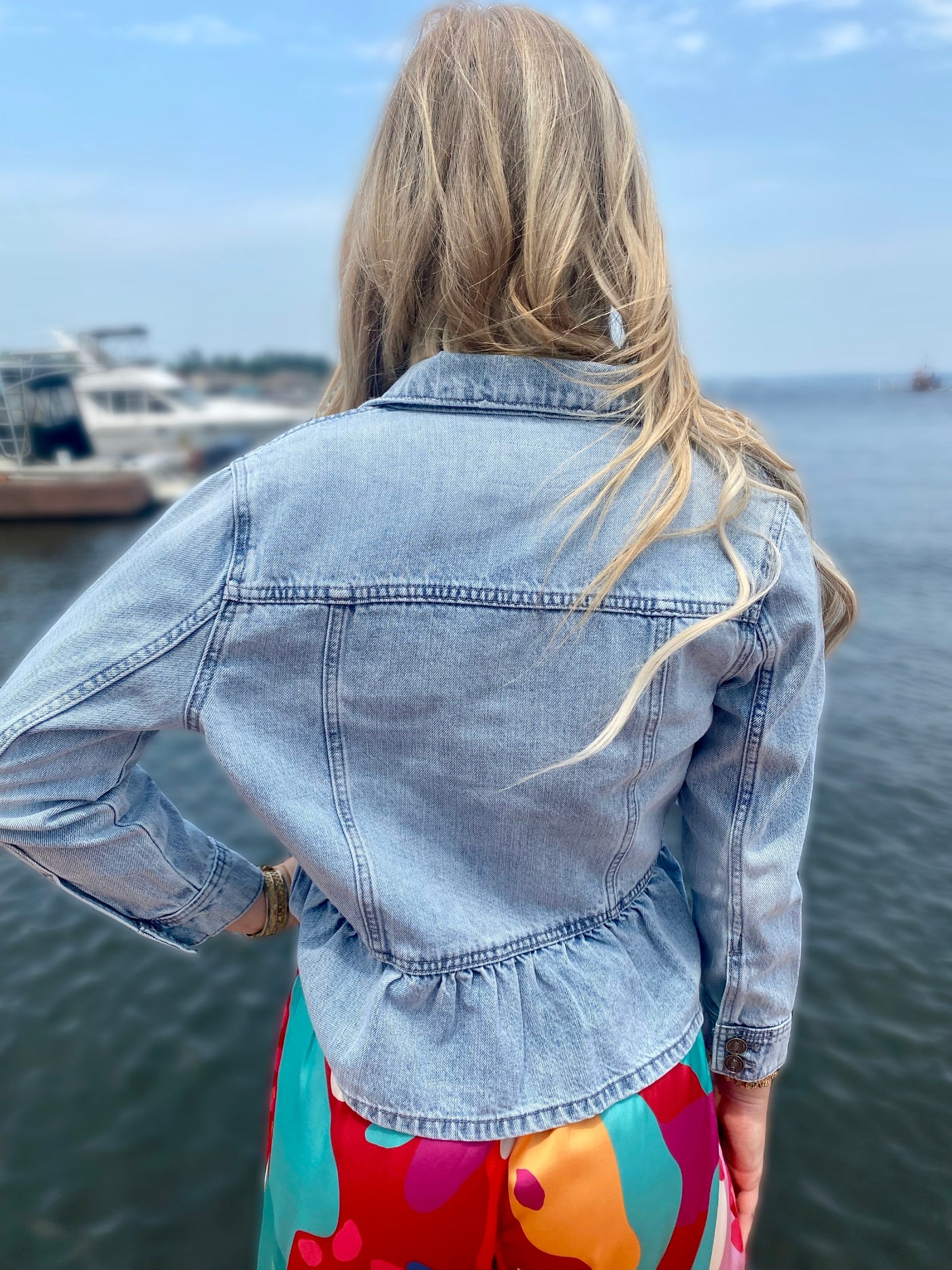 BACK VIEW OF AVA IN JACKET