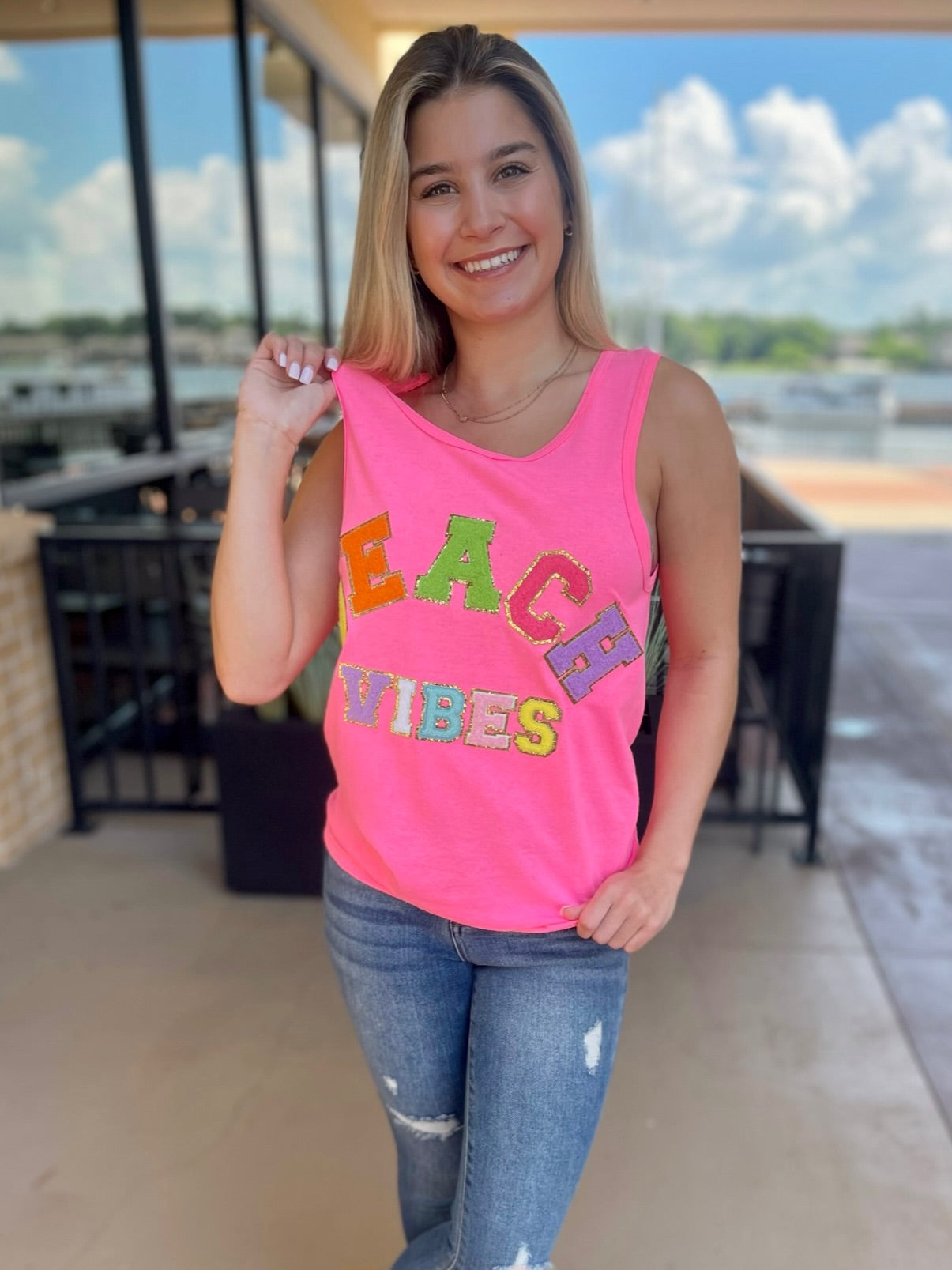 JENNA IN BEACH VIBES TANK TOP SAFETY PINK FRONT VIEW