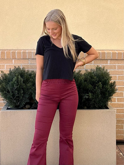 AVA LOOKING DOWNWARDS IN TOP