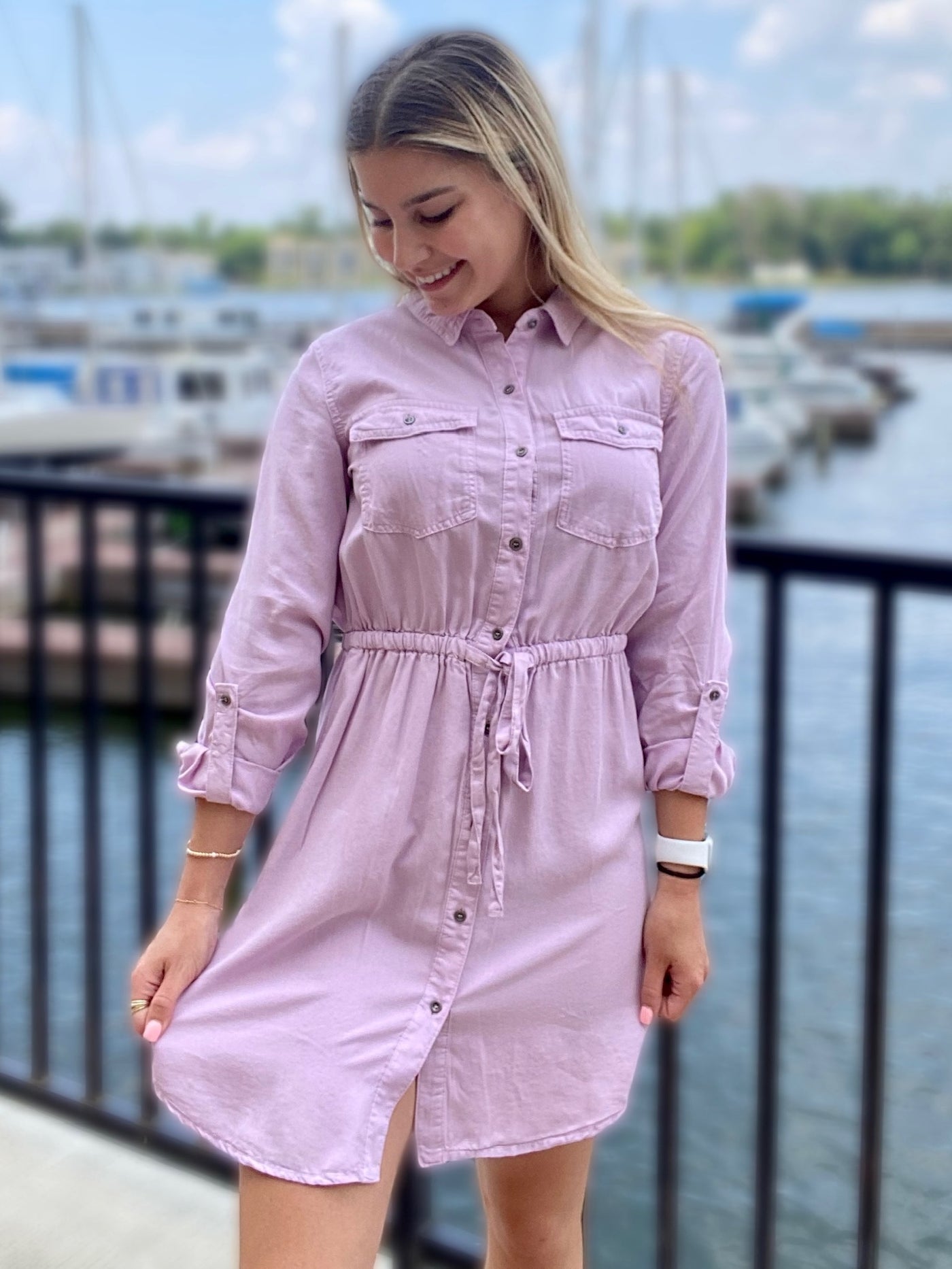 JENNA LOOKING DOWNWARS TO THE LEFT IN DRESS