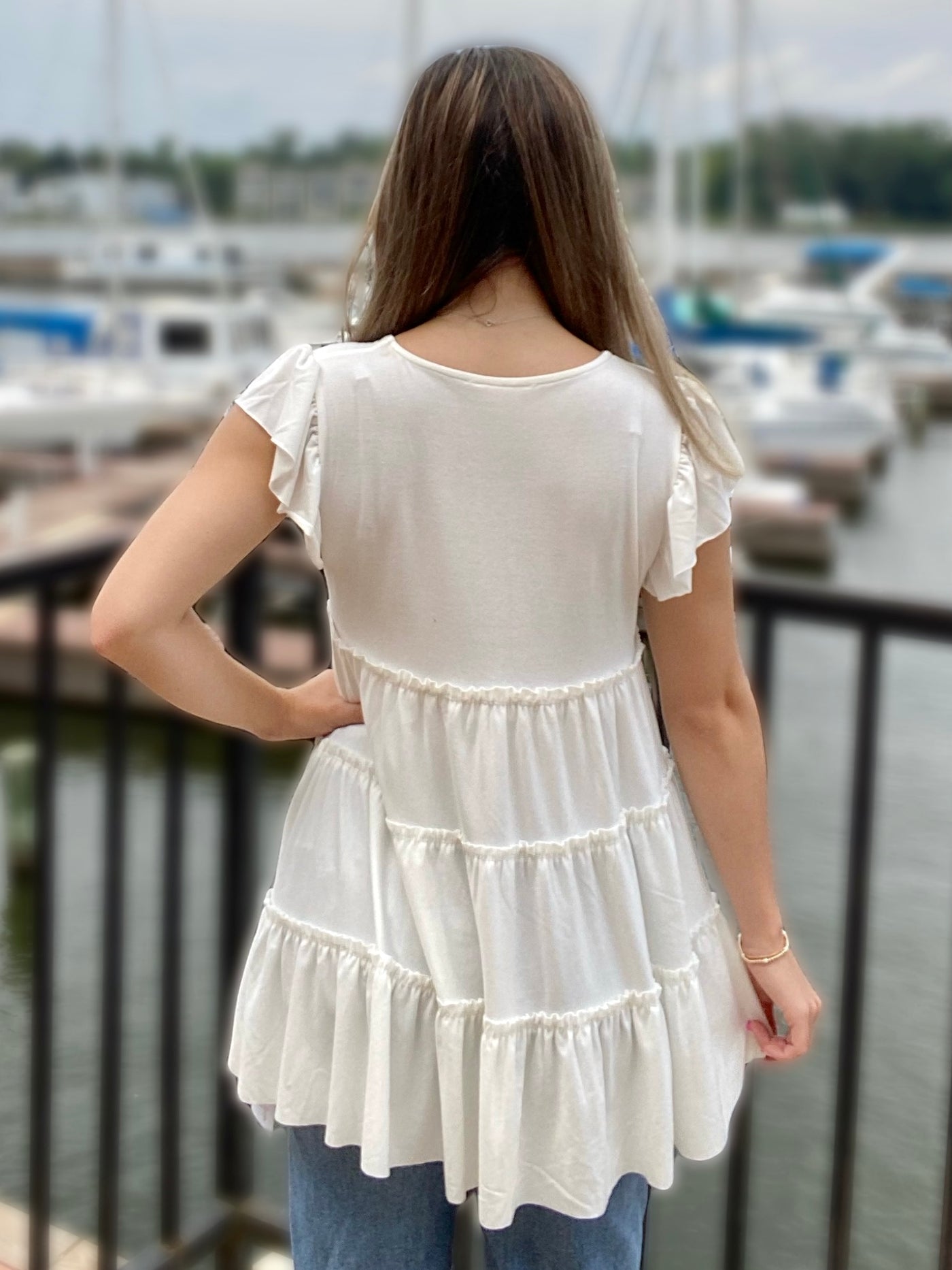 BACK VIEW OF JENNA IN TOP
