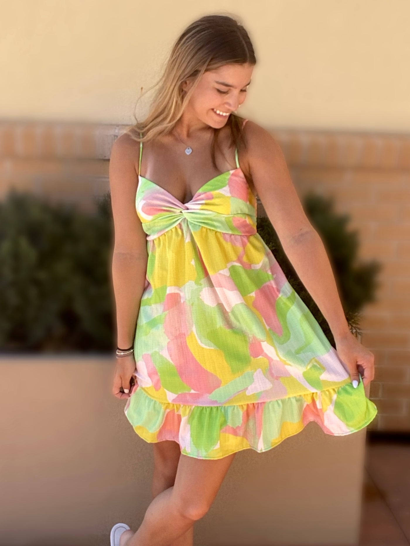 JENNA LOOKING DOWNWARDS IN DRESS