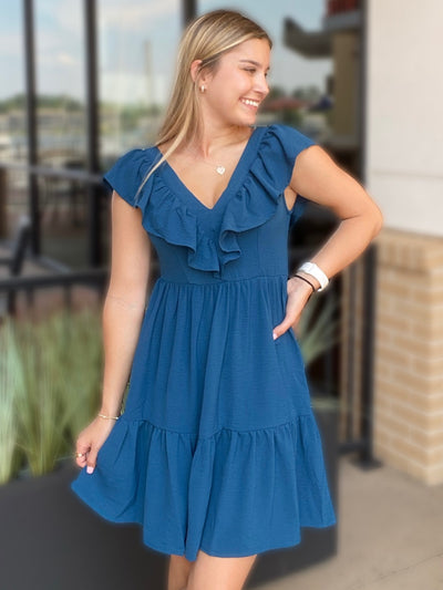 JENNA LOOKING TO THE RIGHT IN DRESS