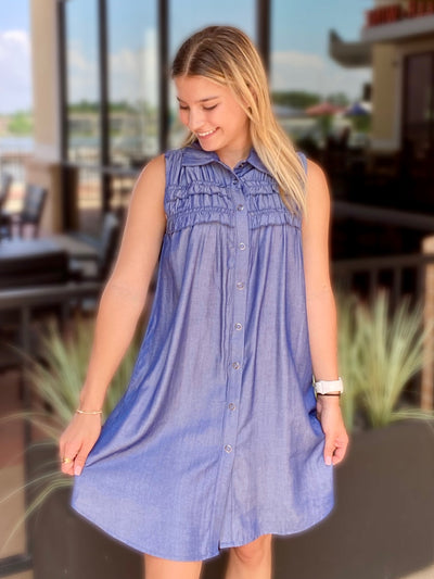 JENNA LOOKING DOWNWARDS LEFT IN DRESS