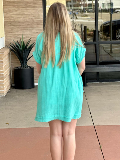 Lexi in mint dress back view