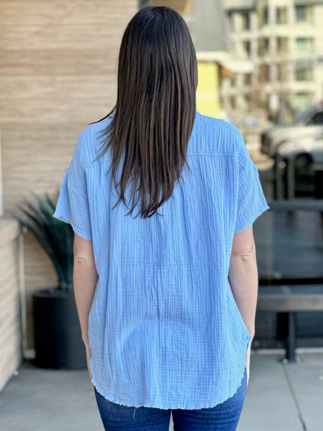 Megan in spring blue shirt back view