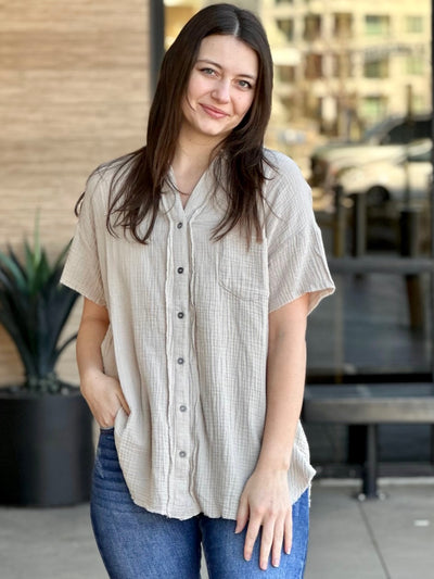 Megan in sand beige shirt front view smiling