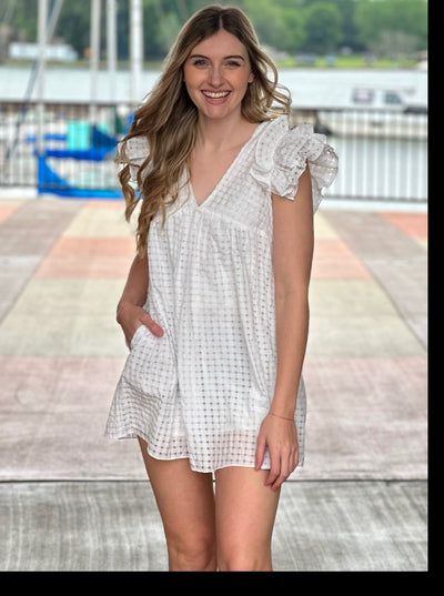 Lexie in white dress front view smiling