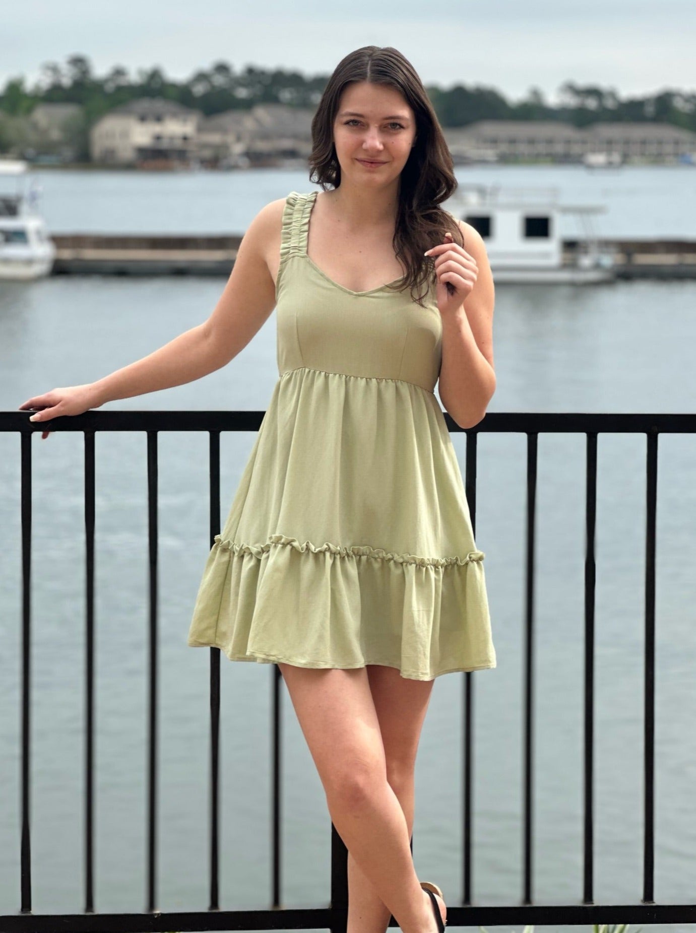 Megan in olive dress front view 