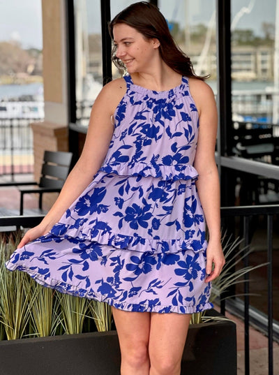 Megan in lavender mix dress looking to the side