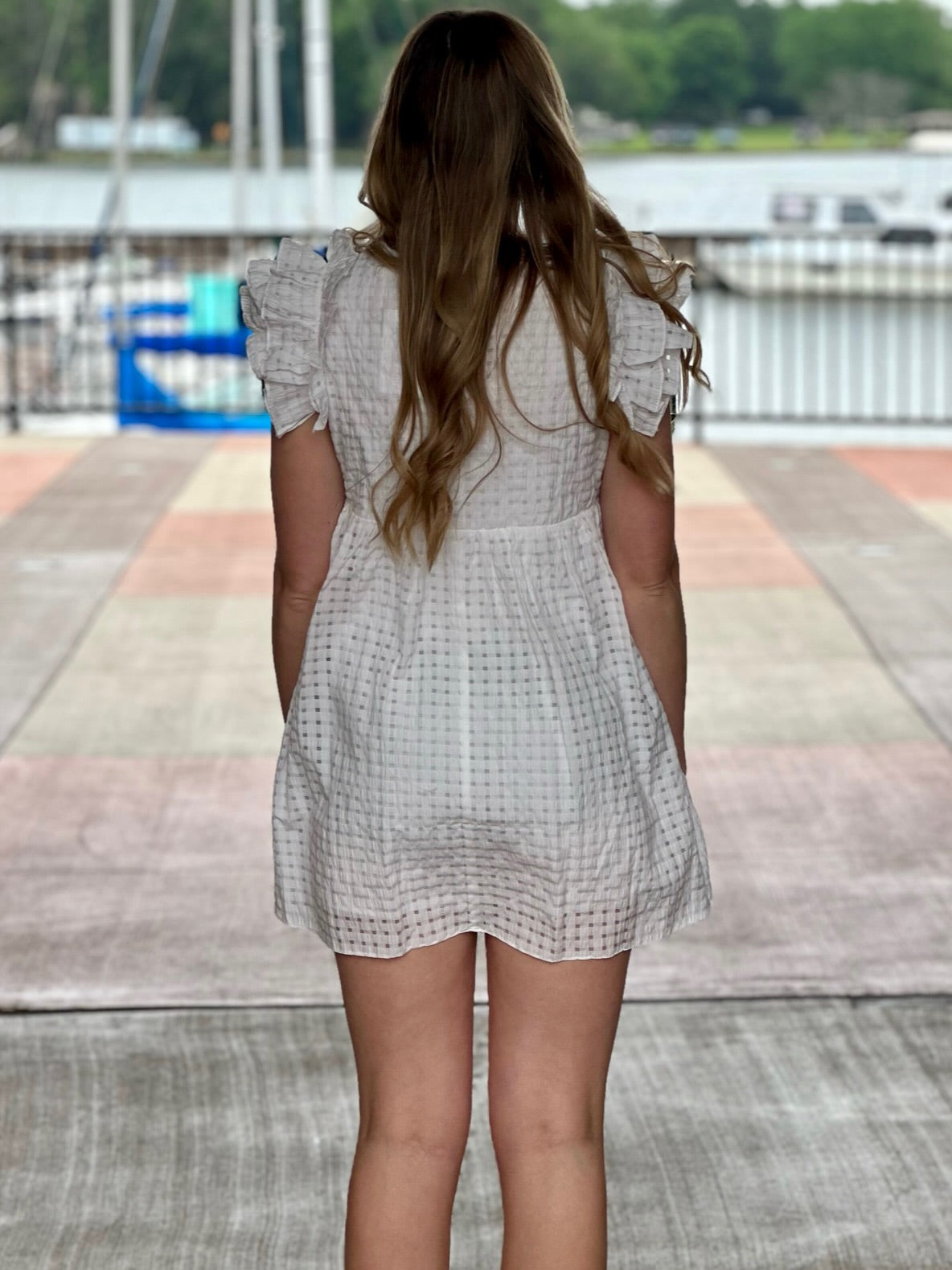 Lexie in white dress back view