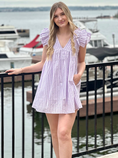 Lexie in lavender dress front view soft smile