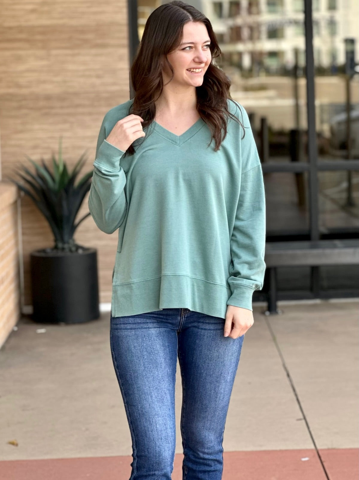 MEGAN IN GREEN SWEATER FRONT