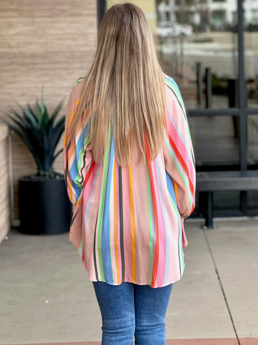 Lexi in blue/pink tunic dress back view