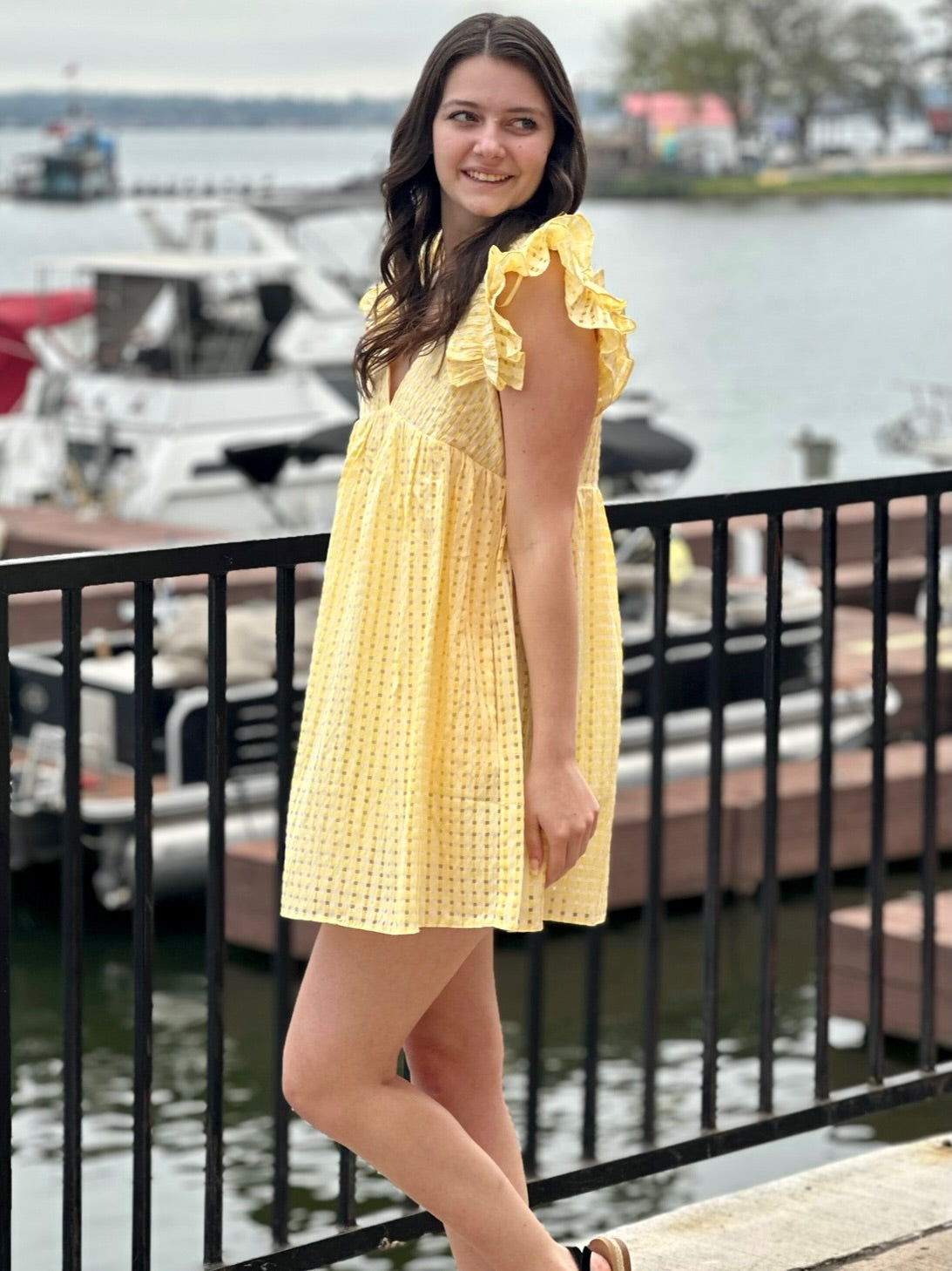 Megan in lemon dress side view