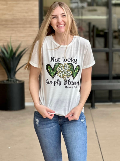 Lexi in simply blessed graphic tee front view laughing
