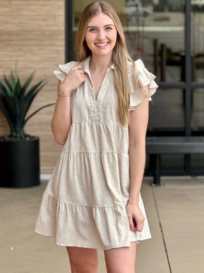 Lexi in oatmeal dress front view