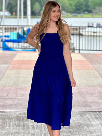 Lexi in bright blue midi dress front view smiling