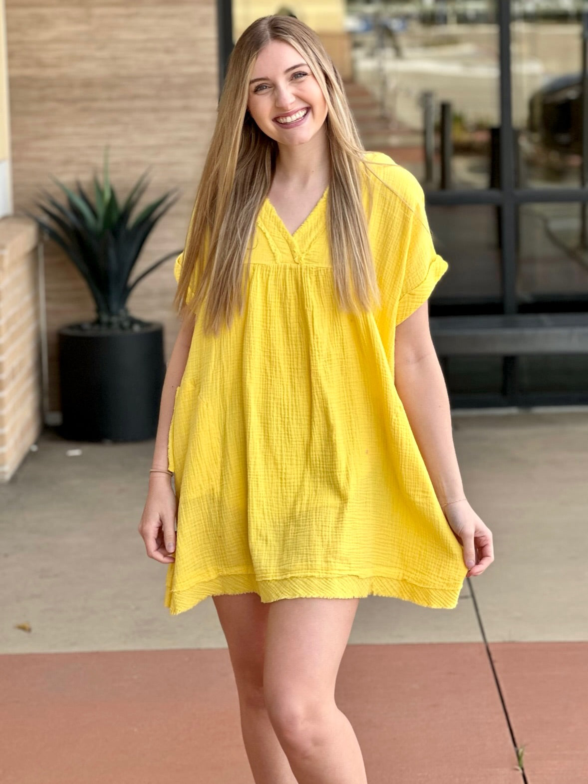 Lexi in yellow dress front view smiling