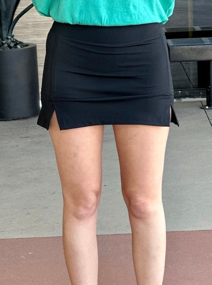 Megan in black skirt front view