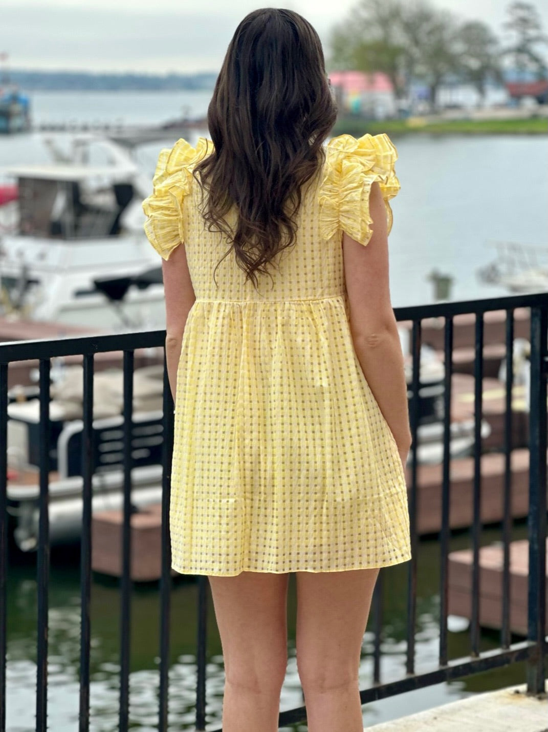 Megan in lemon dress back view