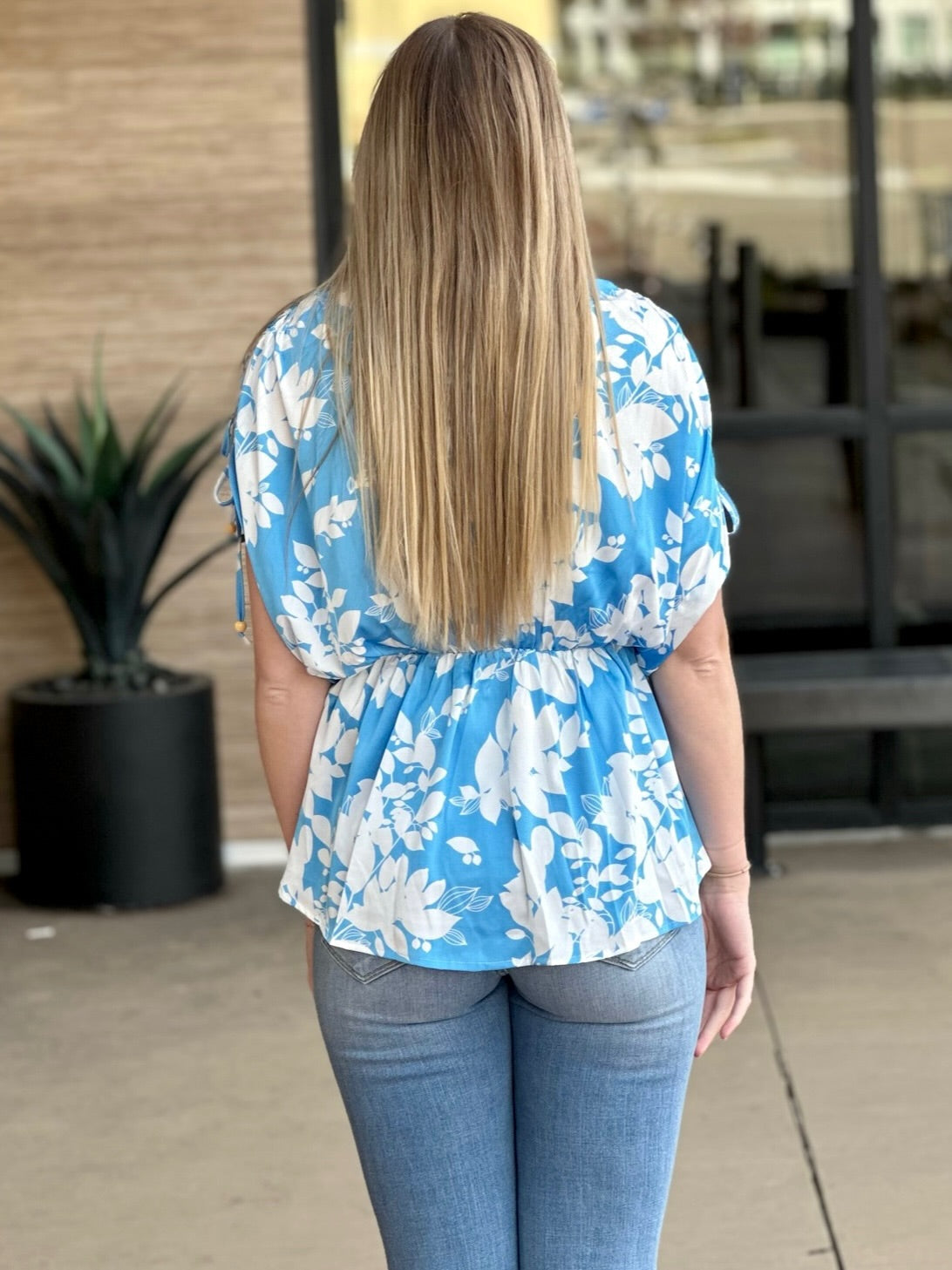 lexie in floral top back view