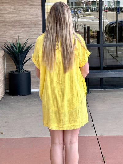 Lexi in yellow dress back view